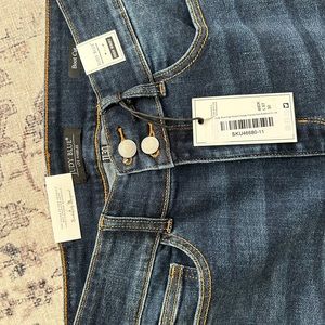 NWT Judy Blue bootcut jeans with raw hem. Size 11/30. High waist.